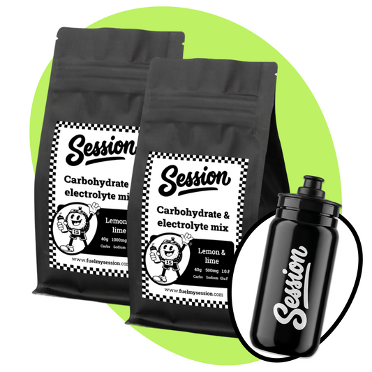 Two black stand-up pouches of Session Carbohydrate & Electrolyte Mix in Lemon & Lime flavor, shown with a matching black water bottle on a white background with a light green circular graphic behind the bags.