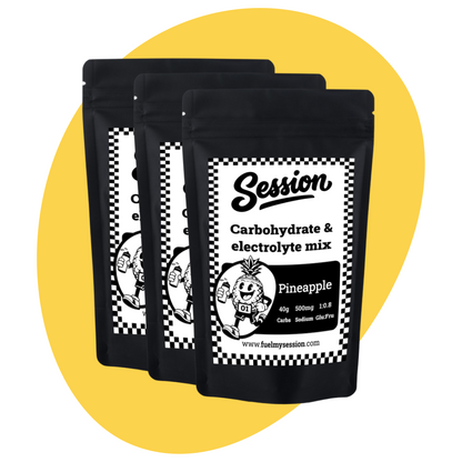 Three black packages of Session carbohydrate and electrolyte mix on a yellow background